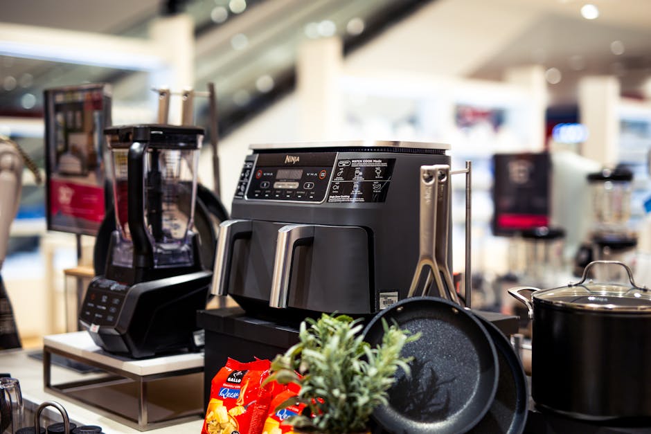 gastroback - Showcase of modern kitchen appliances in a retail store, featuring blenders and cooking